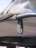 rear window strap wrapped around bar