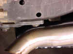 bolt close to muffler