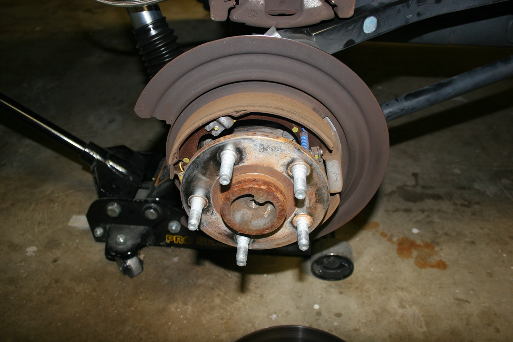 Installing new rear brake pads on a JK